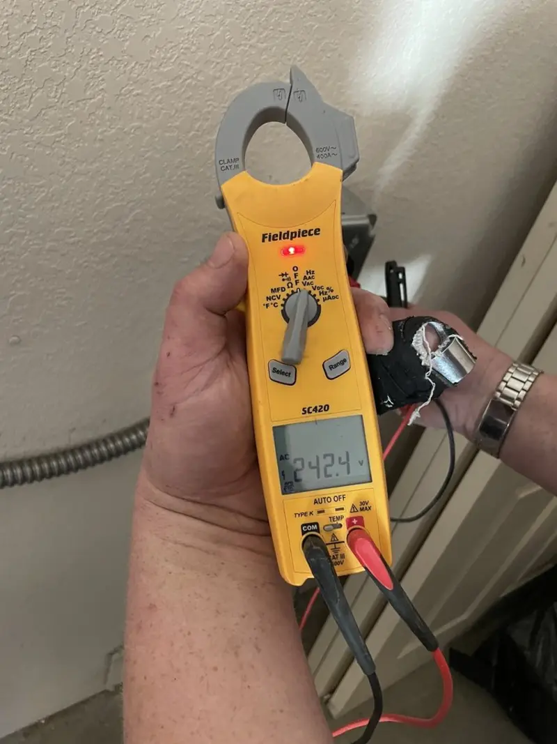Voltage testing with clamp meter during Hot Tub / Pool Electrical Wiring in Smithville